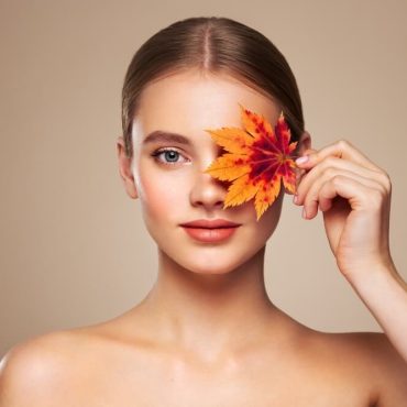 woman holding flower